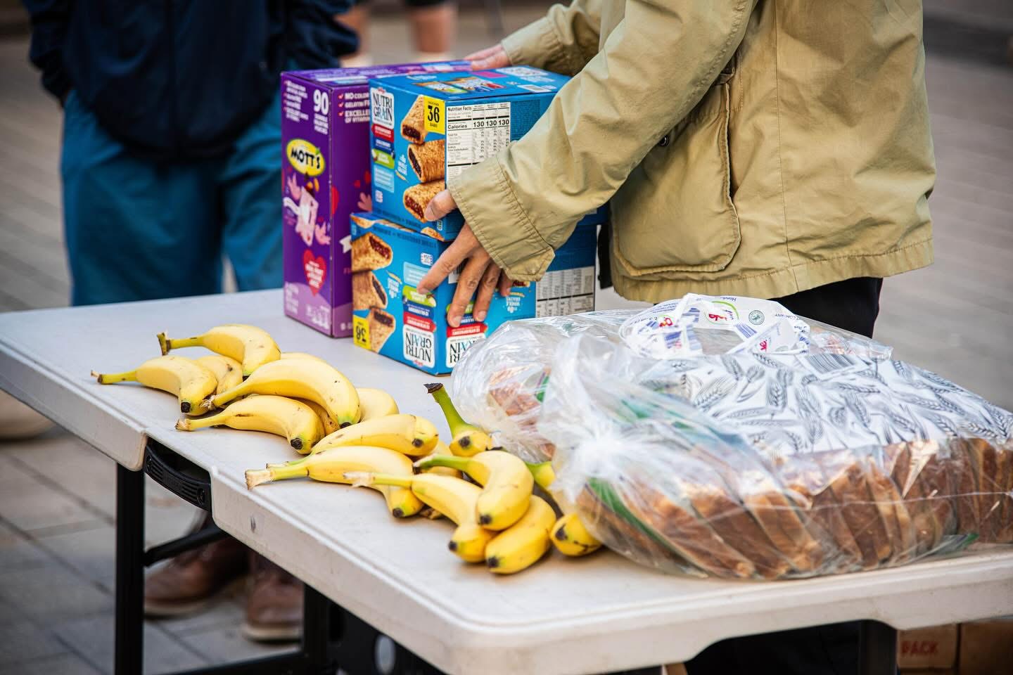 Breakfast supplies laid out on a folding table